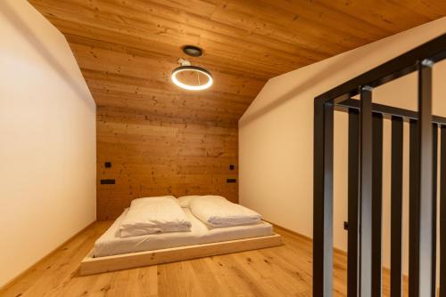 Ένα ή περισσότερα κρεβάτια σε δωμάτιο στο Pure Alpine Suites