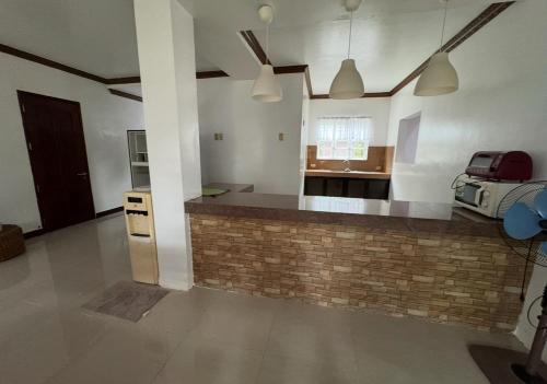 Kuchyň nebo kuchyňský kout v ubytování Q Home