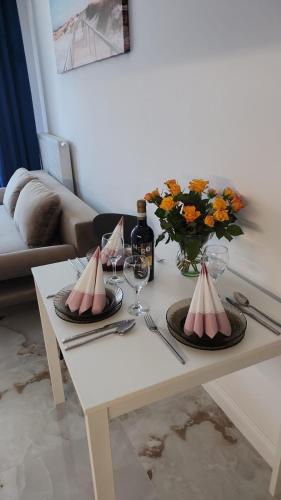Χώρος καθιστικού στο Cukierkowy Apartament