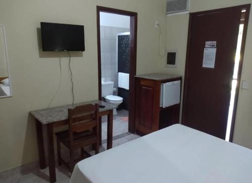 Televisyen dan/atau pusat hiburan di Patipe Praia Hotel