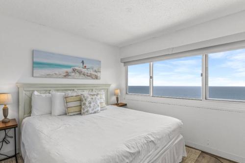Ένα ή περισσότερα κρεβάτια σε δωμάτιο στο The Penthouse at Pinnacle Port #20