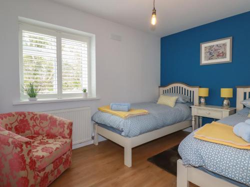 Ένα ή περισσότερα κρεβάτια σε δωμάτιο στο Lowenek