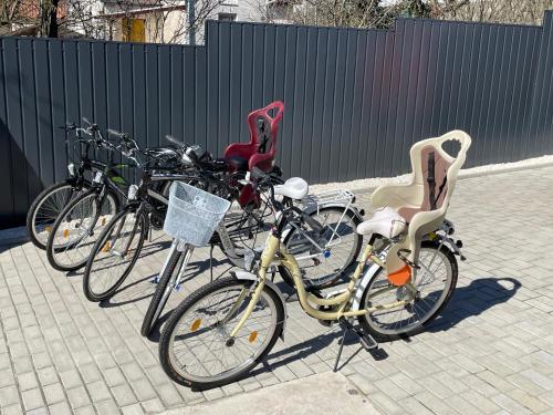 a group of bikes parked next to each other at Málnahome Wellness Apartman in Szob