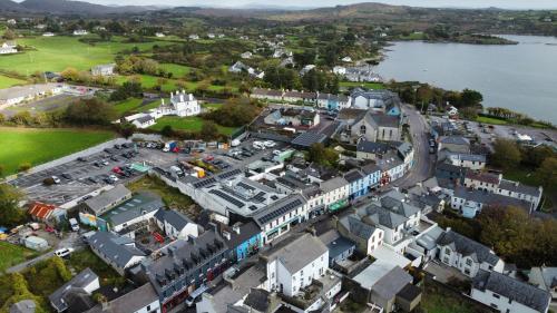 an aerial view of a town with a train station at Number 7 Bank House in Schull