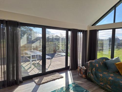 Ruang duduk di Premium Victorian Stables Conversion
