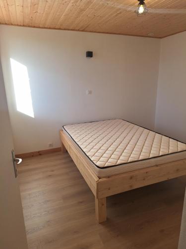 Ένα ή περισσότερα κρεβάτια σε δωμάτιο στο Appartement ELI ELO 2