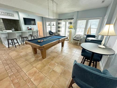 a living room with a pool table in it at D109A- Moby Duck in Sanderling