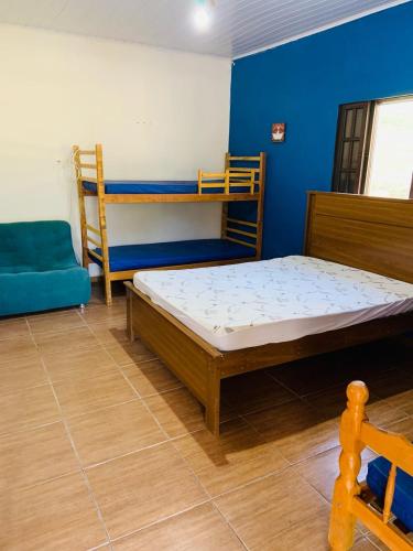 Postel nebo postele na pokoji v ubytování Pousada Rancho Bananas Felizes