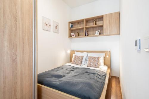 a bedroom with a bed in a small room at Star House in the city in Budapest