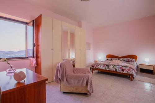 Postel nebo postele na pokoji v ubytování La Finestra sulle Gole del Farfa