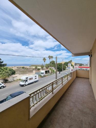 a balcony with a view of a street at Dimora Costa Del Sole in Gallipoli