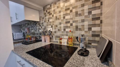 Η κουζίνα ή μικρή κουζίνα στο MINI HOST in LISBON