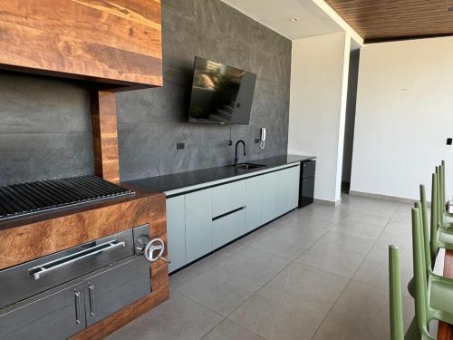 A cozinha ou cozinha compacta de Hermoso departamento en la mejor zona