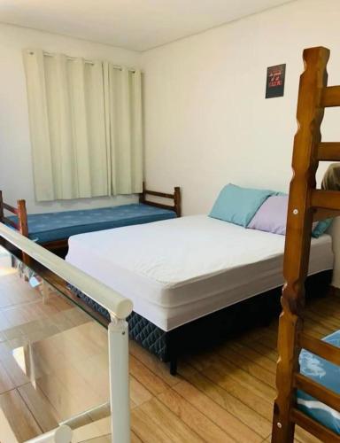 Postel nebo postele na pokoji v ubytování Pousada Rancho Bananas Felizes
