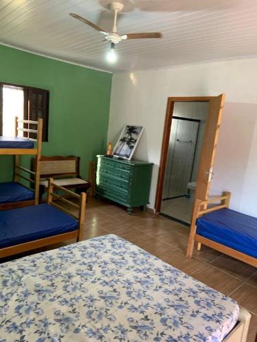 Postel nebo postele na pokoji v ubytování Pousada Rancho Bananas Felizes