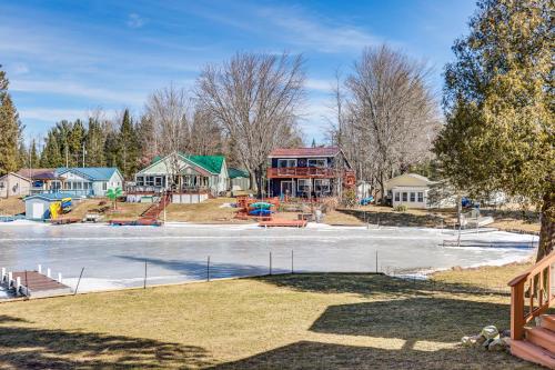 a view of a park with a playground and houses at Ice Fish, Hunt and Explore Farwell Home on Lake in Farwell