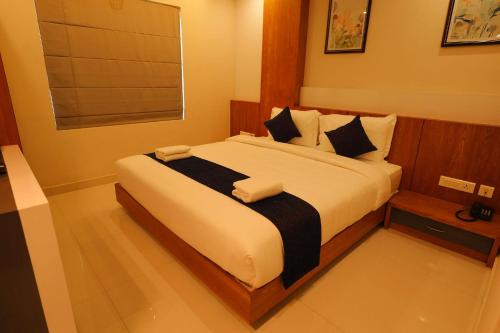 Katil atau katil-katil dalam bilik di Hotel Bluebell