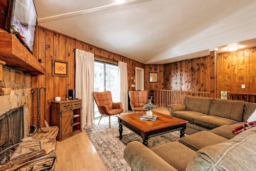 a living room with a couch and a table at Serenity Ridge in Dillard