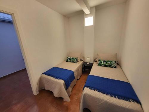 Ένα ή περισσότερα κρεβάτια σε δωμάτιο στο Apartamento Diego
