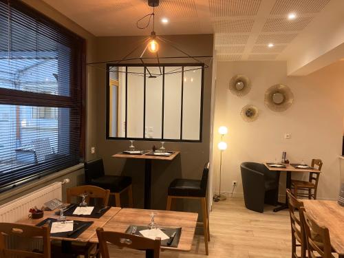 Χώρος καθιστικού στο Logis Hôtel du Nord