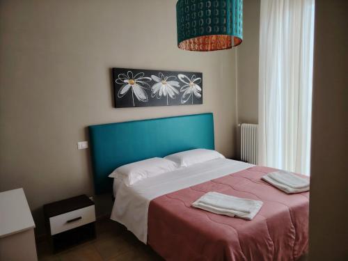 Posteľ alebo postele v izbe v ubytovaní B&B Lucana 22