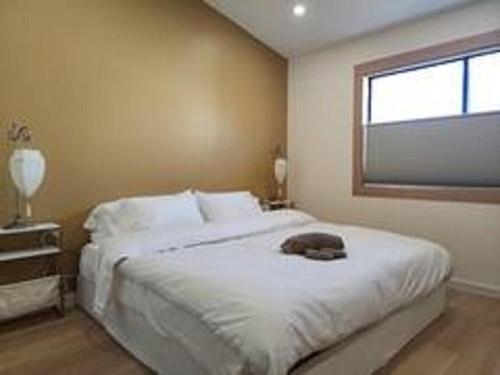 Katil atau katil-katil dalam bilik di Spacious New 3 bedrooms unit