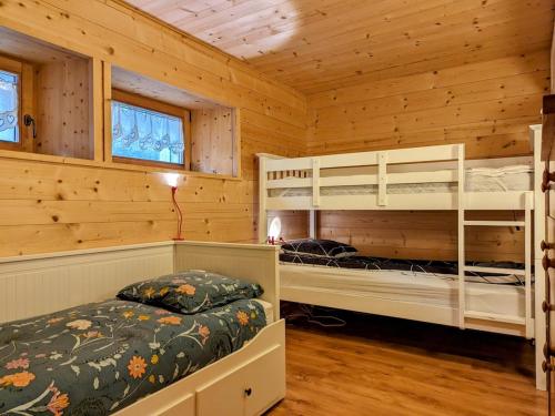 Ένα ή περισσότερα κρεβάτια σε δωμάτιο στο 2-bedroom chalet in Bas Thex, Portes du Soleil