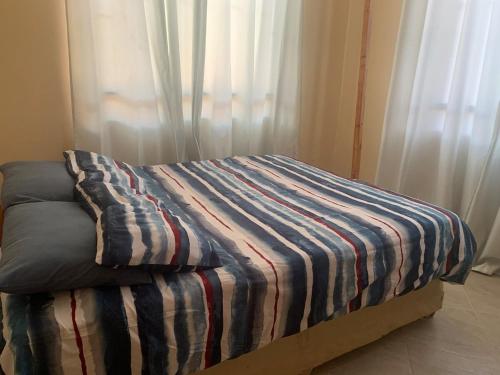 Ein Bett oder Betten in einem Zimmer der Unterkunft Stunning 2BR in Dar Beach, Dining, Transit Nearby