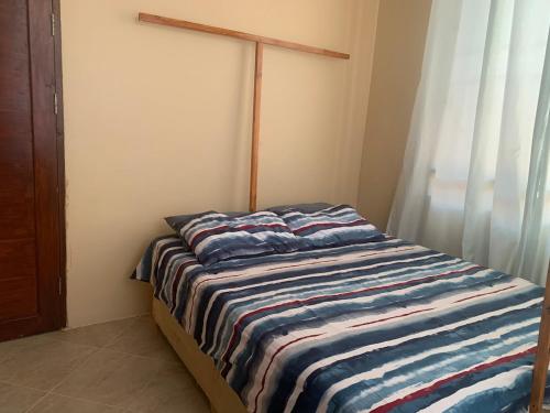Ein Bett oder Betten in einem Zimmer der Unterkunft Stunning 2BR in Dar Beach, Dining, Transit Nearby