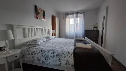 Postel nebo postele na pokoji v ubytování Apartman Darija