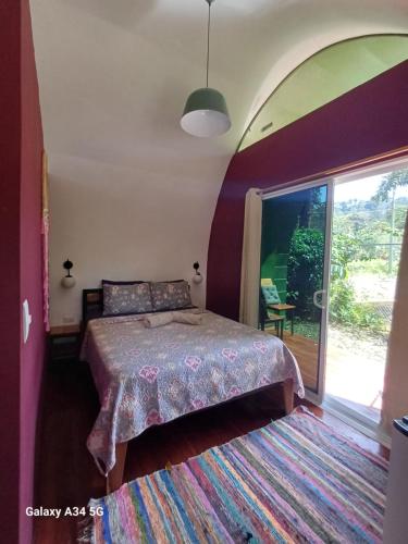 Postel nebo postele na pokoji v ubytování Domos del Caribe