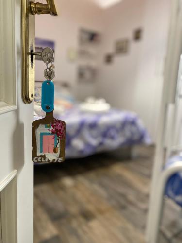 a door knob in a hospital room with a bed at Lipari Centro Storico 5 mins from port Casa Celeste in Lipari
