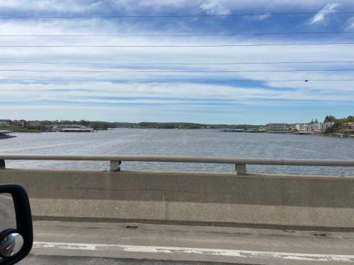 a view of a river from a bridge at STAIRS OPTIONAL! Lakefront! Pool! On Water! Convenient Fishing! in Osage Beach
