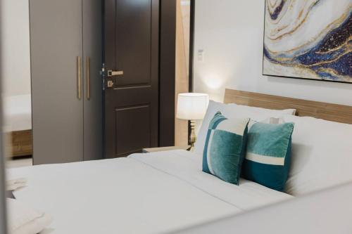 Postel nebo postele na pokoji v ubytování Ruby Residence Fl8 By Homely Malta!