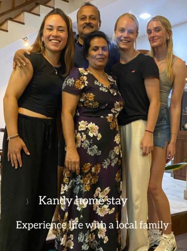 a group of people posing for a picture at Kandy Home stay in Katugastota