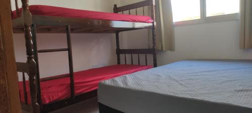Postel nebo postele na pokoji v ubytování Apt 103 Térreo Frente Para o Mar e Piscina Village das Ondas
