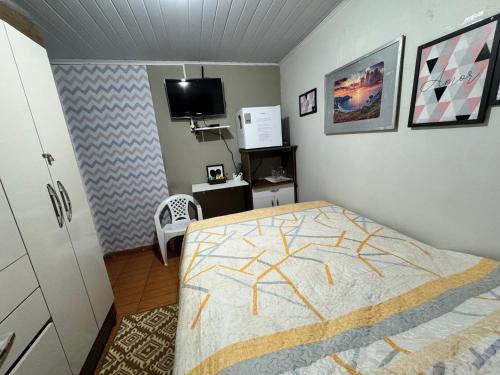 Postel nebo postele na pokoji v ubytování Casa Recanto - Quarto simples