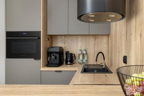 Kuchyň nebo kuchyňský kout v ubytování Czilu Czilu D&D Apartments