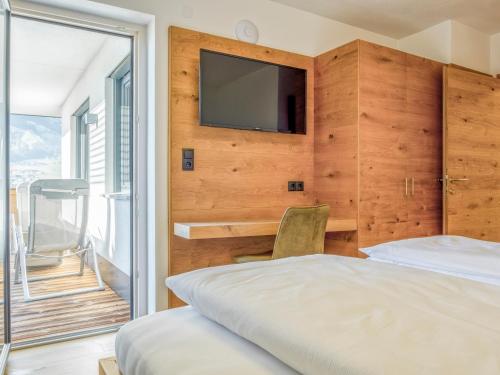 Ein Bett oder Betten in einem Zimmer der Unterkunft Helfensteinblick