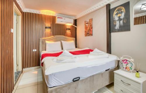 a bedroom with a large bed in a room at Cendere Old City Hotel in Istanbul