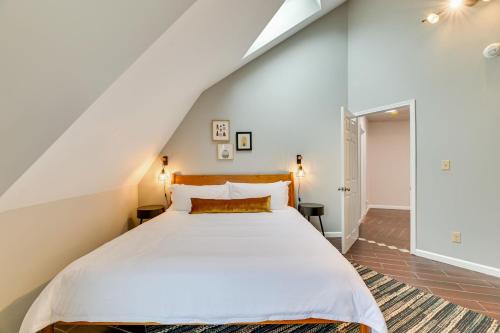 a bedroom with a large white bed in a attic at The Dome' - Spacious Retreat Near Finger Lakes! in Penn Yan