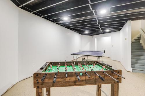 a table with baseball bats on it in a room at The Dome' - Spacious Retreat Near Finger Lakes! in Penn Yan