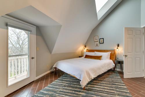 a bedroom with a bed and a large window at The Dome' - Spacious Retreat Near Finger Lakes! in Penn Yan