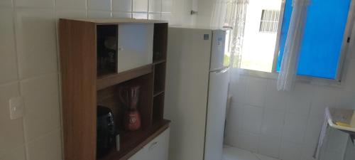 Kuchyň nebo kuchyňský kout v ubytování Apt 103 Térreo Frente Para o Mar e Piscina Village das Ondas