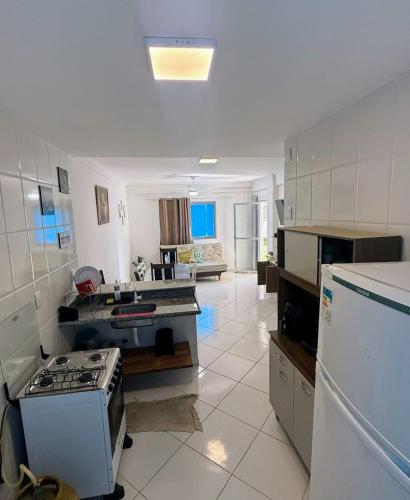 Kuchyň nebo kuchyňský kout v ubytování Apt 103 Térreo Frente Para o Mar e Piscina Village das Ondas