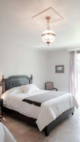 Postel nebo postele na pokoji v ubytování Hotel Alameda Grand