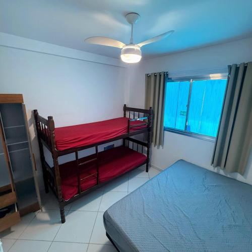 Postel nebo postele na pokoji v ubytování Apt 103 Térreo Frente Para o Mar e Piscina Village das Ondas