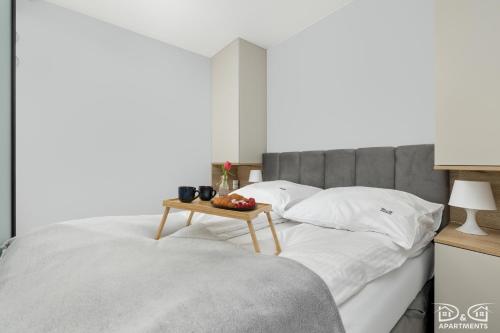 Postel nebo postele na pokoji v ubytování Czilu Czilu D&D Apartments