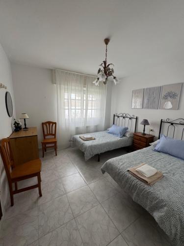 Postel nebo postele na pokoji v ubytování Chalet Sanxenxo Miraflores
