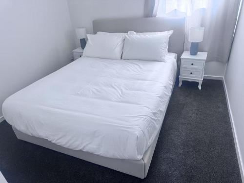 Ένα ή περισσότερα κρεβάτια σε δωμάτιο στο Two Bedroom Apartment